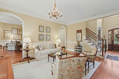 Situated on a beautifully landscaped corner lot in the on Governors Club in North Carolina - for sale on GolfHomes.com, golf home, golf lot