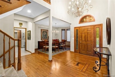 Located on one of Golfside's most desirable lots, this custom R on St Clair River Country Club in Michigan - for sale on GolfHomes.com, golf home, golf lot