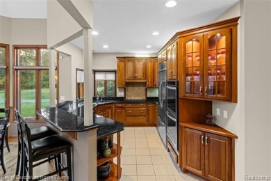 Located on one of Golfside's most desirable lots, this custom R on St Clair River Country Club in Michigan - for sale on GolfHomes.com, golf home, golf lot