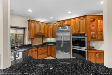 Located on one of Golfside's most desirable lots, this custom R on St Clair River Country Club in Michigan - for sale on GolfHomes.com, golf home, golf lot