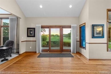 Located on one of Golfside's most desirable lots, this custom R on St Clair River Country Club in Michigan - for sale on GolfHomes.com, golf home, golf lot