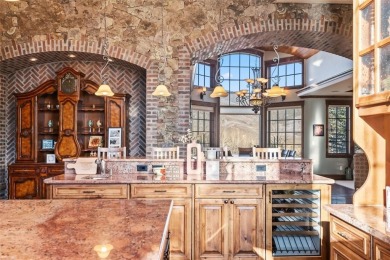 2140 Hunters Knob Road blends timeless masonry, elegant finishes on Raven Golf Club At Three Peaks in Colorado - for sale on GolfHomes.com, golf home, golf lot