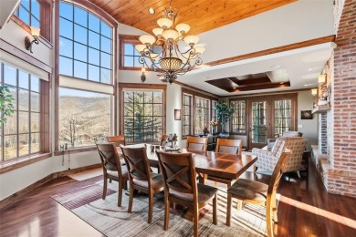 2140 Hunters Knob Road blends timeless masonry, elegant finishes on Raven Golf Club At Three Peaks in Colorado - for sale on GolfHomes.com, golf home, golf lot