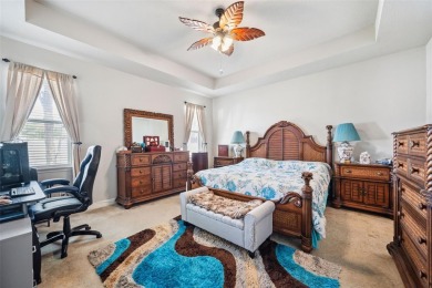 Welcome to 13523 Meadow Golf Ave, a beautifully maintained on Meadow Oaks Golf and Country Club in Florida - for sale on GolfHomes.com, golf home, golf lot
