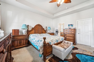 Welcome to 13523 Meadow Golf Ave, a beautifully maintained on Meadow Oaks Golf and Country Club in Florida - for sale on GolfHomes.com, golf home, golf lot
