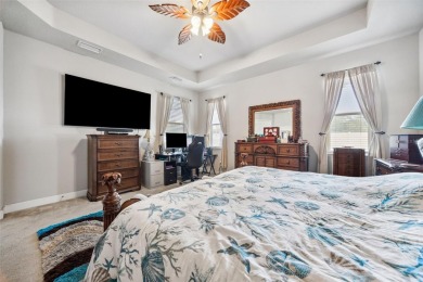 Welcome to 13523 Meadow Golf Ave, a beautifully maintained on Meadow Oaks Golf and Country Club in Florida - for sale on GolfHomes.com, golf home, golf lot