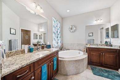 Welcome to 13523 Meadow Golf Ave, a beautifully maintained on Meadow Oaks Golf and Country Club in Florida - for sale on GolfHomes.com, golf home, golf lot