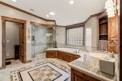 2140 Hunters Knob Road blends timeless masonry, elegant finishes on Raven Golf Club At Three Peaks in Colorado - for sale on GolfHomes.com, golf home, golf lot