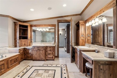 2140 Hunters Knob Road blends timeless masonry, elegant finishes on Raven Golf Club At Three Peaks in Colorado - for sale on GolfHomes.com, golf home, golf lot