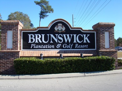 RARE FIND - GOLF FRONT GROUND FLOOR END UNIT CONDO in the on Brunswick Plantation and Golf Resorts in North Carolina - for sale on GolfHomes.com, golf home, golf lot