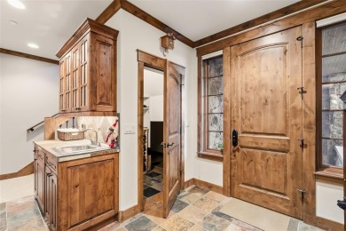 2140 Hunters Knob Road blends timeless masonry, elegant finishes on Raven Golf Club At Three Peaks in Colorado - for sale on GolfHomes.com, golf home, golf lot