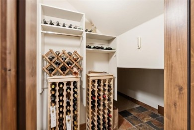 2140 Hunters Knob Road blends timeless masonry, elegant finishes on Raven Golf Club At Three Peaks in Colorado - for sale on GolfHomes.com, golf home, golf lot