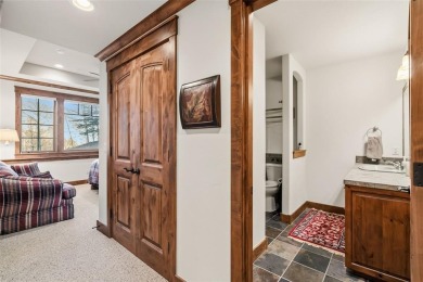 2140 Hunters Knob Road blends timeless masonry, elegant finishes on Raven Golf Club At Three Peaks in Colorado - for sale on GolfHomes.com, golf home, golf lot