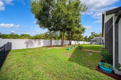 Welcome to 13523 Meadow Golf Ave, a beautifully maintained on Meadow Oaks Golf and Country Club in Florida - for sale on GolfHomes.com, golf home, golf lot