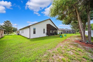 Welcome to 13523 Meadow Golf Ave, a beautifully maintained on Meadow Oaks Golf and Country Club in Florida - for sale on GolfHomes.com, golf home, golf lot