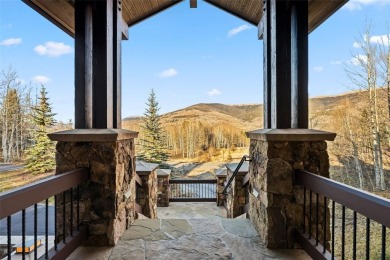 2140 Hunters Knob Road blends timeless masonry, elegant finishes on Raven Golf Club At Three Peaks in Colorado - for sale on GolfHomes.com, golf home, golf lot