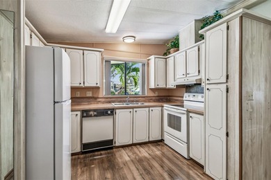 Welcome to Glenwood Estates, one of the area's most vibrant 55+ on Largo Golf Course in Florida - for sale on GolfHomes.com, golf home, golf lot