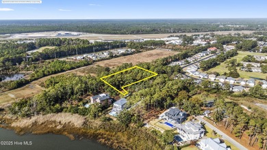 PREMIER WATER-VIEW HOMESITE in Barnes Bluff -- At nearly an acre on South Harbour Golf Links in North Carolina - for sale on GolfHomes.com, golf home, golf lot
