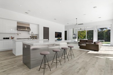A contemporary, light-filled home on an oversized lot with 165 on Boca Raton Resort and Club in Florida - for sale on GolfHomes.com, golf home, golf lot