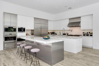 A contemporary, light-filled home on an oversized lot with 165 on Boca Raton Resort and Club in Florida - for sale on GolfHomes.com, golf home, golf lot