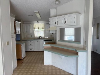 This home is in a 55 plus community with a monthly lot rent of on Crystal Lake Club in Florida - for sale on GolfHomes.com, golf home, golf lot