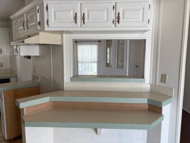 This home is in a 55 plus community with a monthly lot rent of on Crystal Lake Club in Florida - for sale on GolfHomes.com, golf home, golf lot
