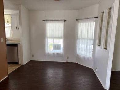 This home is in a 55 plus community with a monthly lot rent of on Crystal Lake Club in Florida - for sale on GolfHomes.com, golf home, golf lot