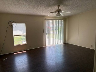 This home is in a 55 plus community with a monthly lot rent of on Crystal Lake Club in Florida - for sale on GolfHomes.com, golf home, golf lot