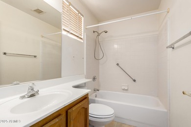 Spacious single-story home in PebbleCreek, a premier 55+ luxury on Eagles Nest at Pebble Creek in Arizona - for sale on GolfHomes.com, golf home, golf lot