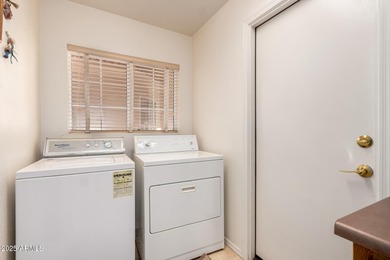 Spacious single-story home in PebbleCreek, a premier 55+ luxury on Eagles Nest at Pebble Creek in Arizona - for sale on GolfHomes.com, golf home, golf lot