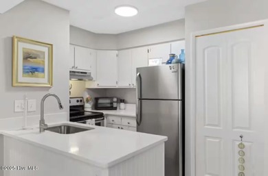 Recently updated and move-in ready, this top-floor 1-bedroom on Carolina Shores Golf Course in North Carolina - for sale on GolfHomes.com, golf home, golf lot