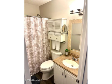 Recently updated and move-in ready, this top-floor 1-bedroom on Carolina Shores Golf Course in North Carolina - for sale on GolfHomes.com, golf home, golf lot