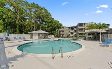 Recently updated and move-in ready, this top-floor 1-bedroom on Carolina Shores Golf Course in North Carolina - for sale on GolfHomes.com, golf home, golf lot