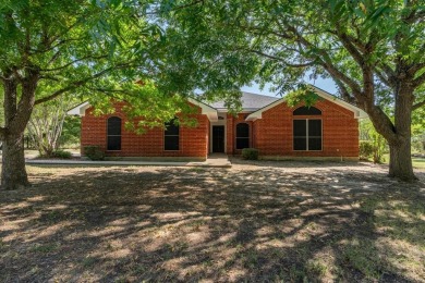 This beautifully maintained brick home is in a quite tree-shaded on White Bluff Resort - New Course in Texas - for sale on GolfHomes.com, golf home, golf lot