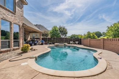 Discover this beautifully upgraded 4-bedroom, 4-bathroom home on Sky Creek Ranch Golf Club in Texas - for sale on GolfHomes.com, golf home, golf lot