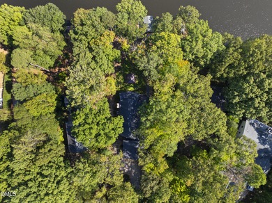 Exceptional Lakefront Living Awaits! Welcome to your picturesque on River Golf and Country Club at Lake Royale in North Carolina - for sale on GolfHomes.com, golf home, golf lot