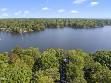 Exceptional Lakefront Living Awaits! Welcome to your picturesque on River Golf and Country Club at Lake Royale in North Carolina - for sale on GolfHomes.com, golf home, golf lot