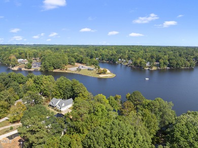 Exceptional Lakefront Living Awaits! Welcome to your picturesque on River Golf and Country Club at Lake Royale in North Carolina - for sale on GolfHomes.com, golf home, golf lot