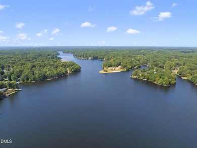 Exceptional Lakefront Living Awaits! Welcome to your picturesque on River Golf and Country Club at Lake Royale in North Carolina - for sale on GolfHomes.com, golf home, golf lot
