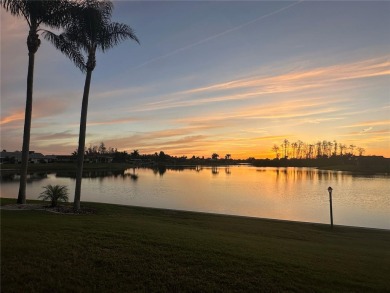 This stunning home offers unparalleled views of a tranquil lake on Freedom Fairways in Florida - for sale on GolfHomes.com, golf home, golf lot