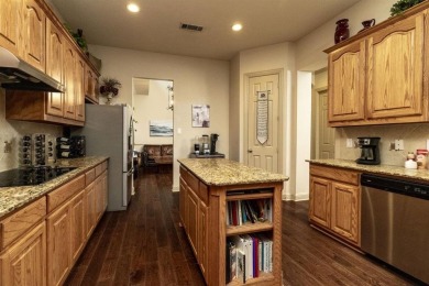 Spacious 2 story home tucked in a quiet cul-de-sac with stunning on WestRidge Golf Course in Texas - for sale on GolfHomes.com, golf home, golf lot