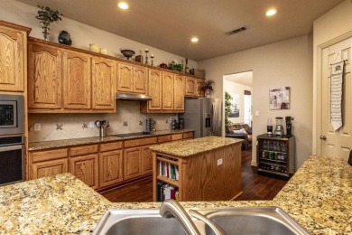 Spacious 2 story home tucked in a quiet cul-de-sac with stunning on WestRidge Golf Course in Texas - for sale on GolfHomes.com, golf home, golf lot