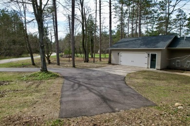 Welcome to Michaywe! This beautifully updated 3-bedroom, 2-bath on Michaywe Pines Course in Michigan - for sale on GolfHomes.com, golf home, golf lot