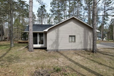 Welcome to Michaywe! This beautifully updated 3-bedroom, 2-bath on Michaywe Pines Course in Michigan - for sale on GolfHomes.com, golf home, golf lot