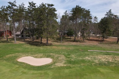 Welcome to Michaywe! This beautifully updated 3-bedroom, 2-bath on Michaywe Pines Course in Michigan - for sale on GolfHomes.com, golf home, golf lot