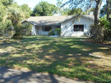 BEAUTIFUL SPACIOUS POOL HOME! This 4 bedroom 2 1/2 baths & 2 car on Sugarmill Woods Golf and Country Club in Florida - for sale on GolfHomes.com, golf home, golf lot