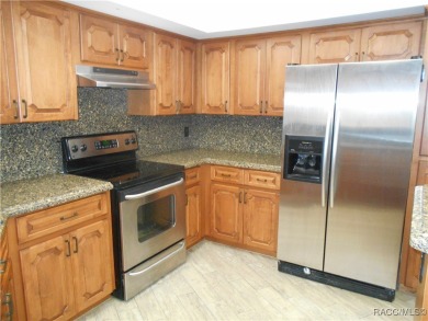 BEAUTIFUL SPACIOUS POOL HOME! This 4 bedroom 2 1/2 baths & 2 car on Sugarmill Woods Golf and Country Club in Florida - for sale on GolfHomes.com, golf home, golf lot