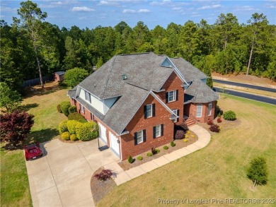 Welcome to this stunning 4 bed, 4 full bath custom home in the on Gates Four Golf and Country Club in North Carolina - for sale on GolfHomes.com, golf home, golf lot