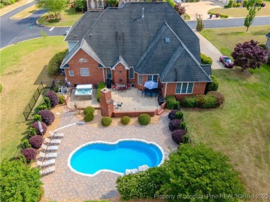 Welcome to this stunning 4 bed, 4 full bath custom home in the on Gates Four Golf and Country Club in North Carolina - for sale on GolfHomes.com, golf home, golf lot