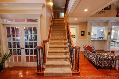 Welcome to this stunning 4 bed, 4 full bath custom home in the on Gates Four Golf and Country Club in North Carolina - for sale on GolfHomes.com, golf home, golf lot